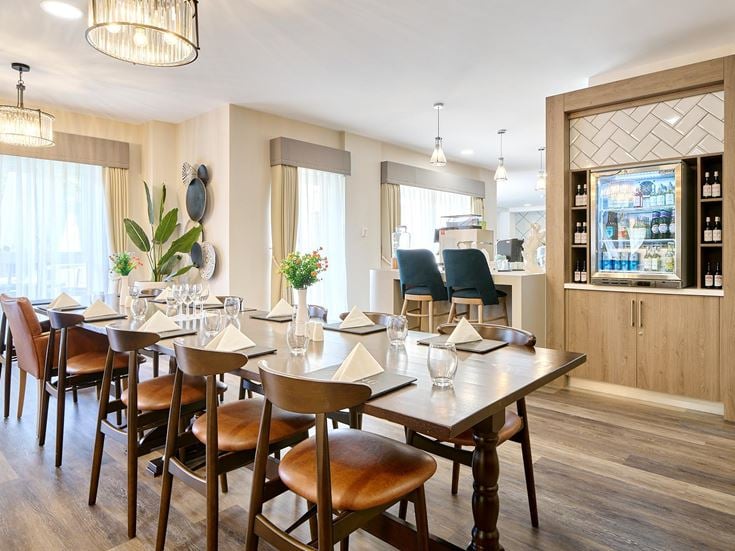a dining room table with chairs