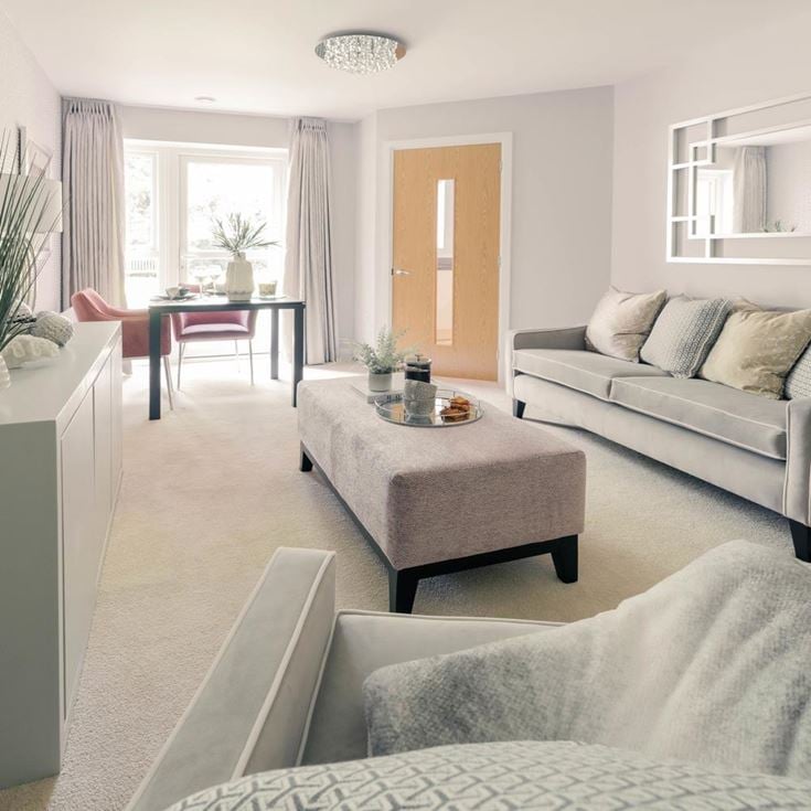 a living room with a couch and a coffee table