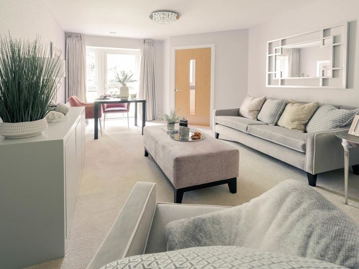 a living room with a couch and a coffee table