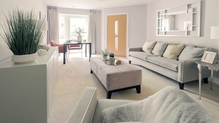 a living room with a couch and a coffee table
