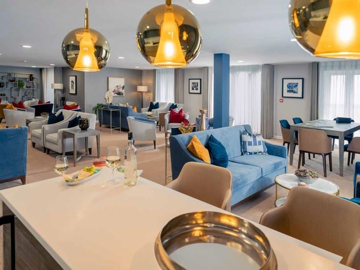 Centennial Place lounge & kitchen