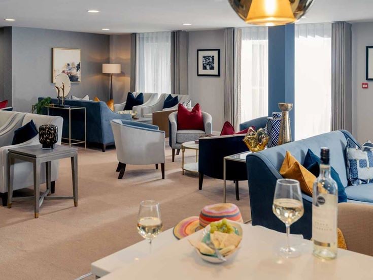 Centennial Place lounge & kitchen