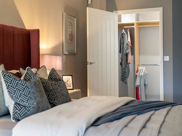Centennial Place apartment bedroom walk in wardrobe