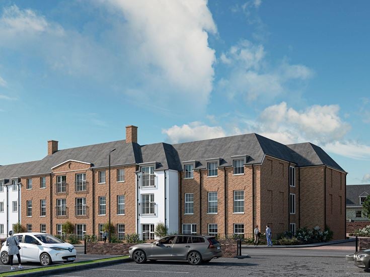 a brick building with cars parked in front of it