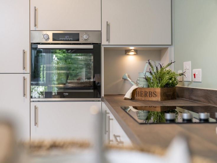 a kitchen with a glass door