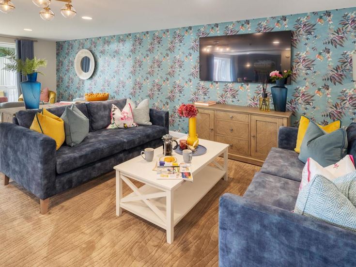a living room with blue walls