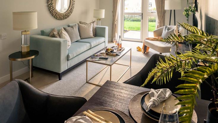 a living room with a couch and a coffee table