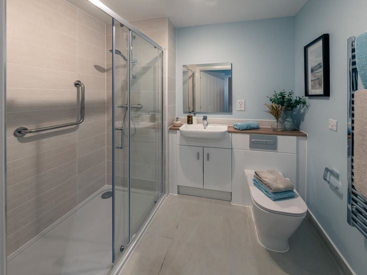 a bathroom with a glass shower