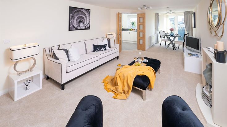 a bedroom with a bed and a tv