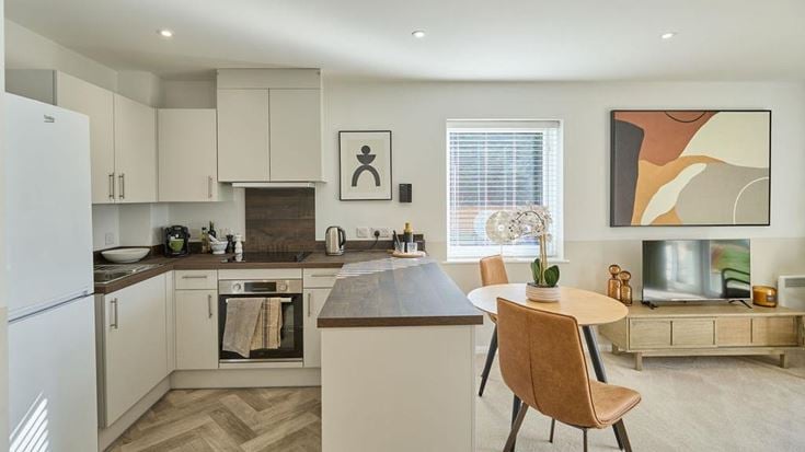 a kitchen with white cabinets