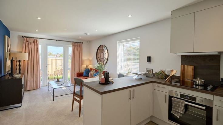 a kitchen with white cabinets