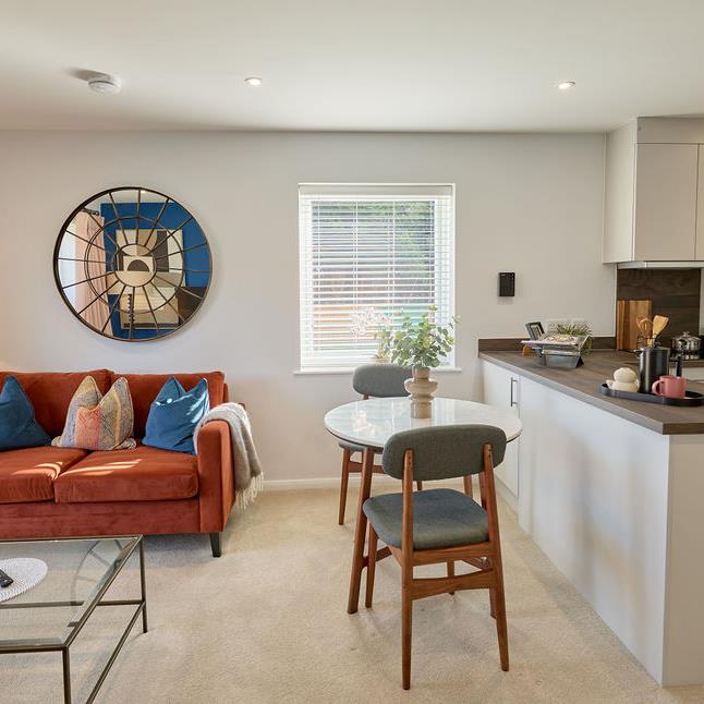 a living room with a couch and a table