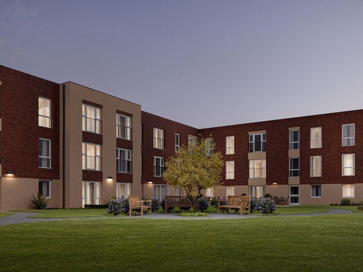 a building with a lawn in front