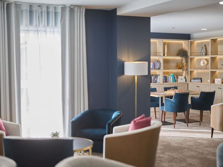 a room with a table and chairs