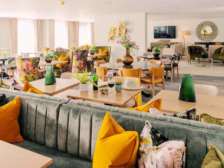 a living room with a couch and a coffee table
