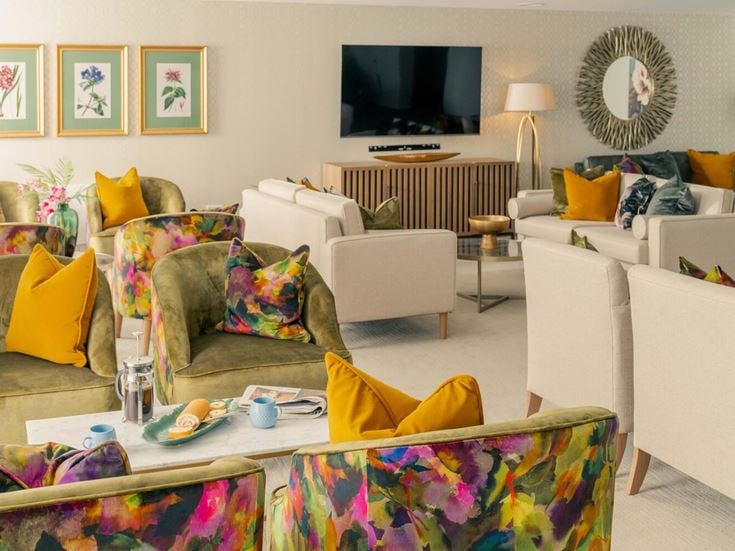 a living room with a couch and a tv
