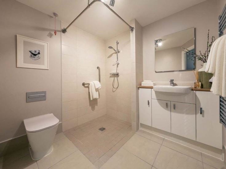 a bathroom with a toilet and sink
