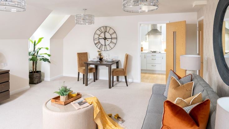 a living room with a large clock