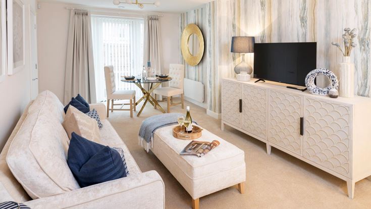a living room with a couch and a table