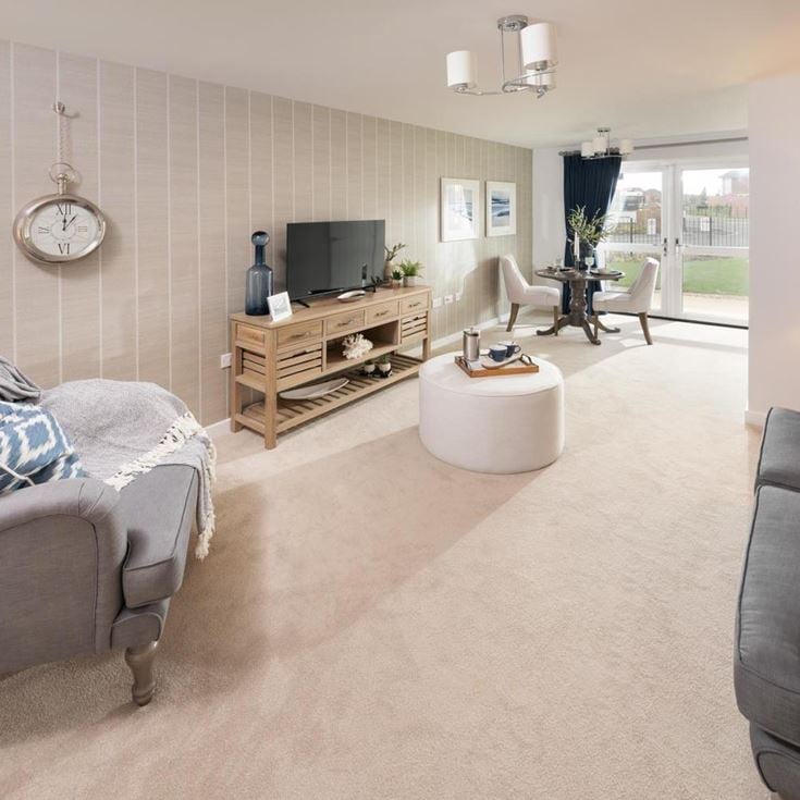 a living room with a couch and a tv