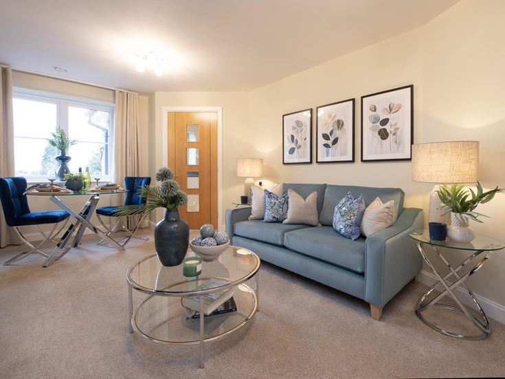 a living room with a couch and coffee table