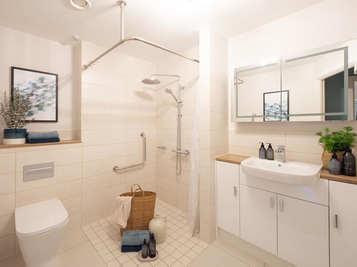a bathroom with a shower and sink