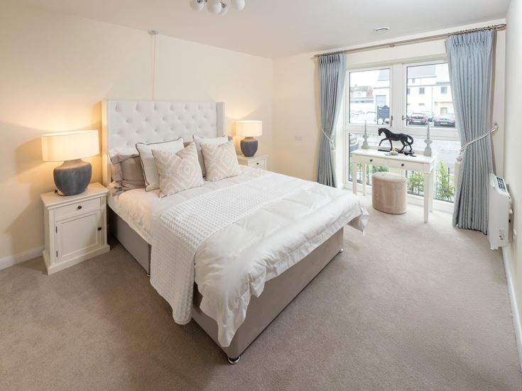 a bedroom with a large bed