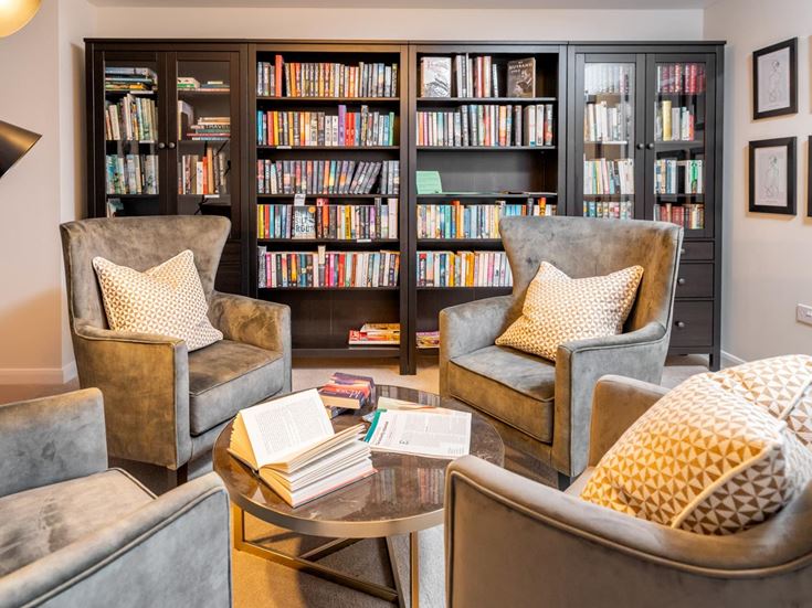 a living room with a bookcase