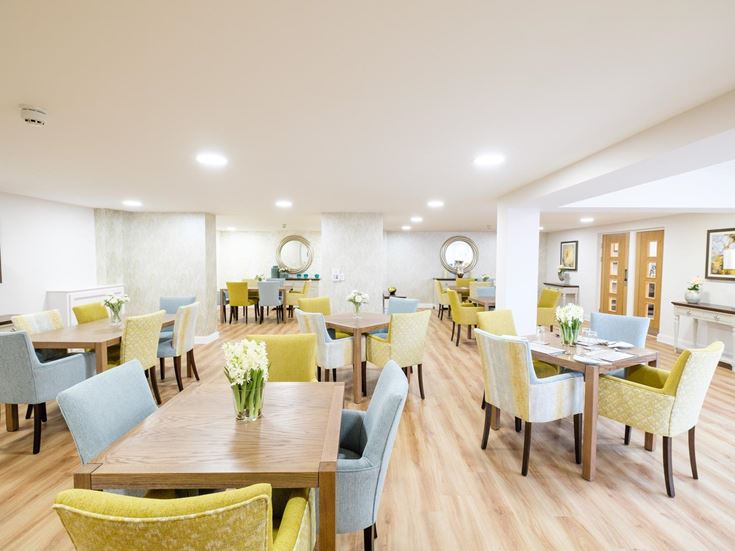 a room with tables and chairs