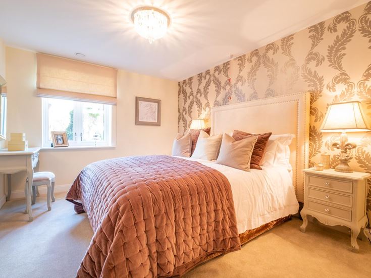a bedroom with a large bed