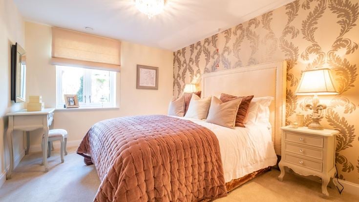 a bedroom with a large bed