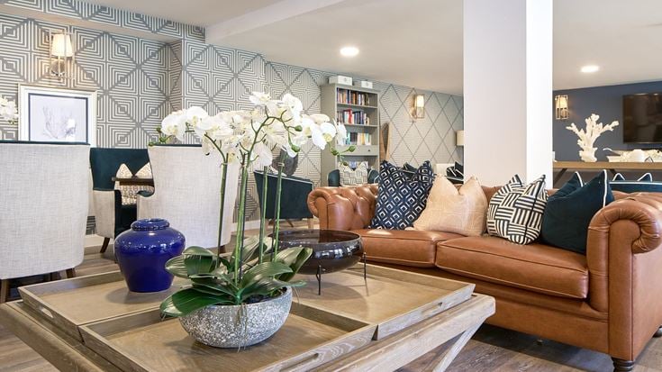 a living room with a couch and a coffee table