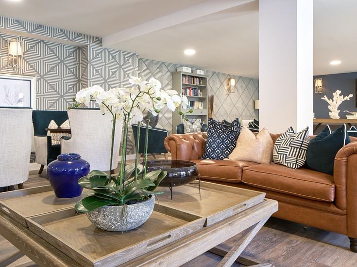 a living room with a couch and a coffee table
