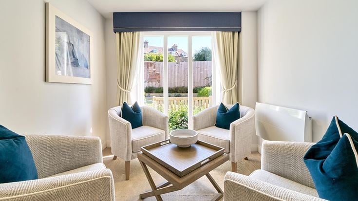 a living room with a couch and a coffee table
