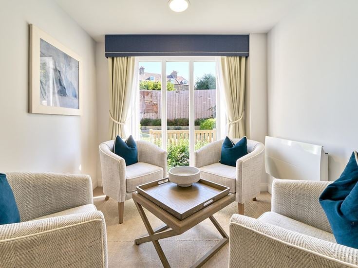 a living room with a couch and a coffee table