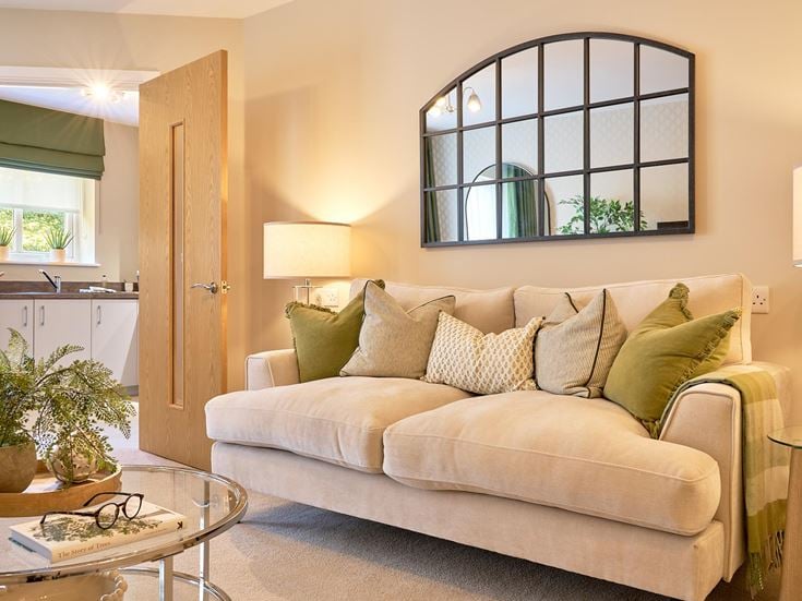 a living room with a couch and a table