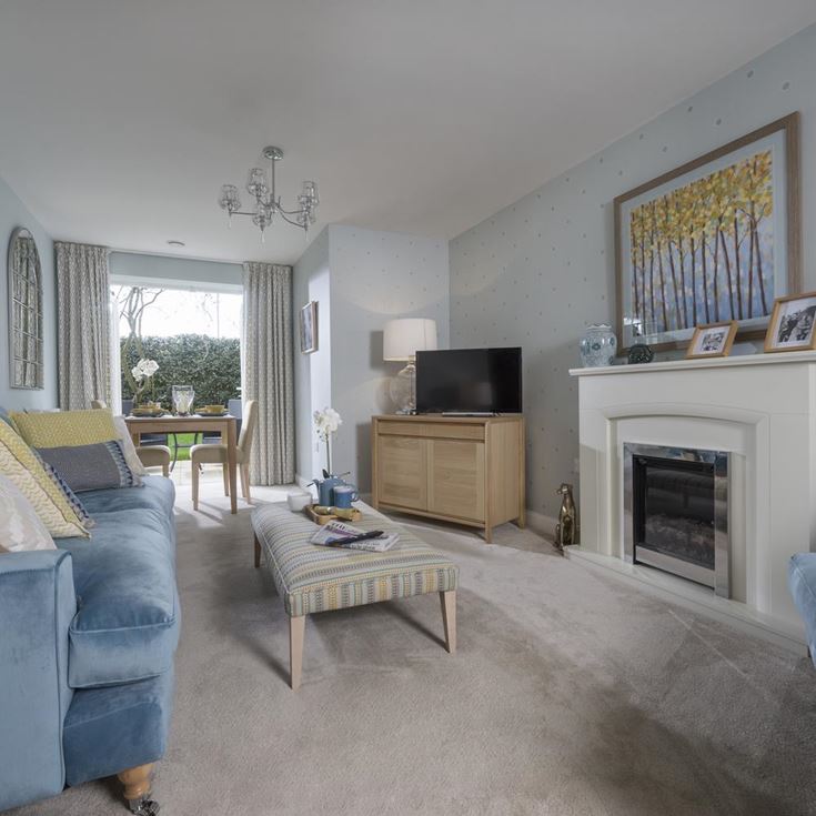a living room with a fireplace