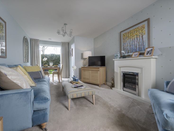 a living room with a fireplace