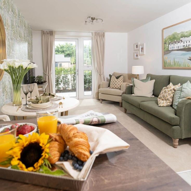 a living room with a couch and a table