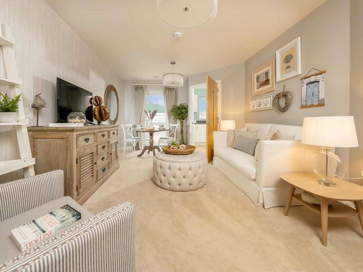 a living room with a couch and a table
