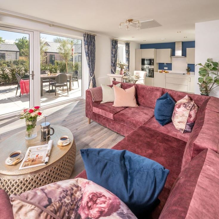 a living room with a couch and a coffee table