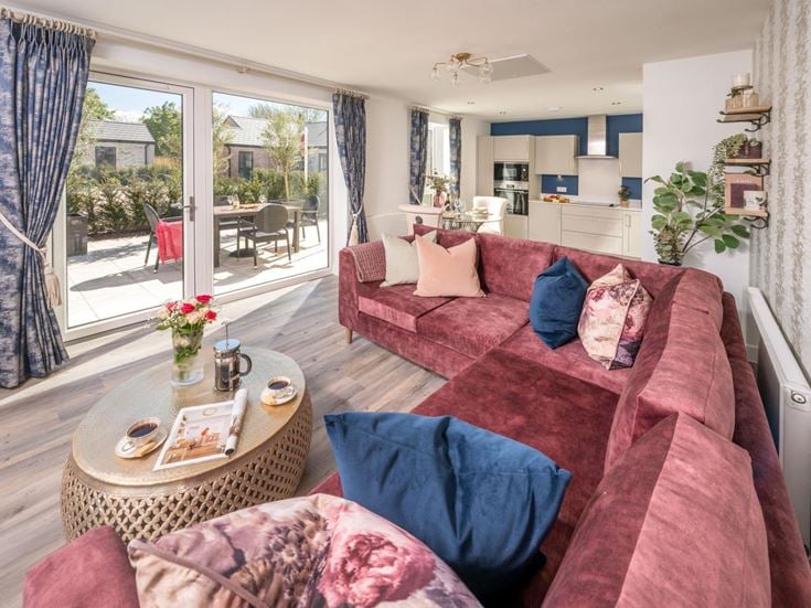 a living room with a couch and a coffee table