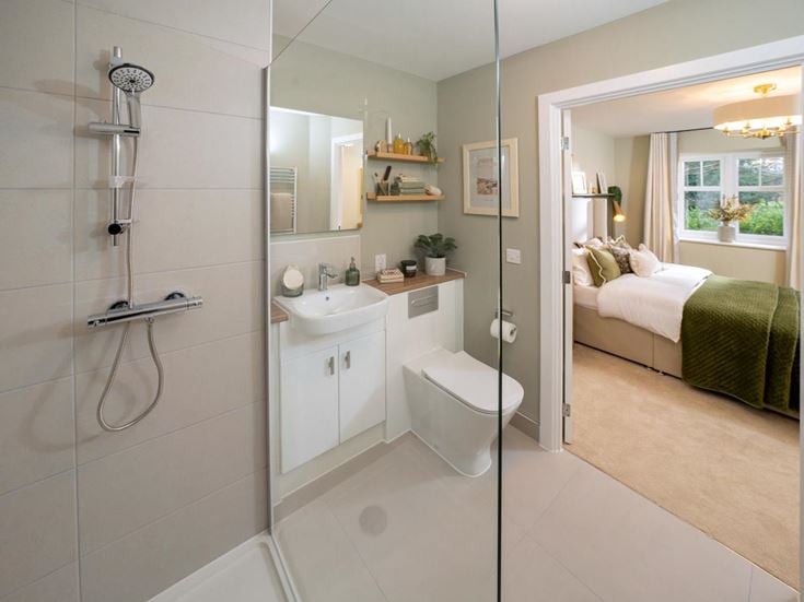 a bathroom with a tub toilet and sink