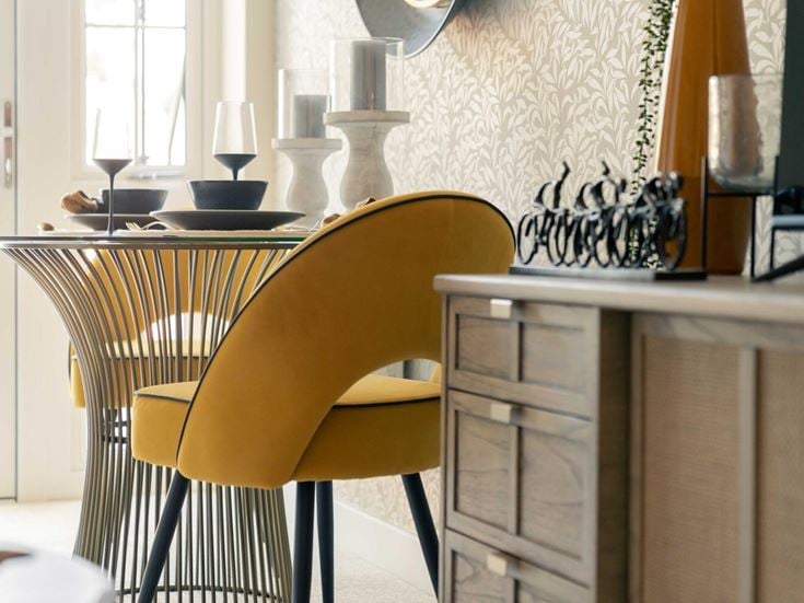 a yellow chair in a room