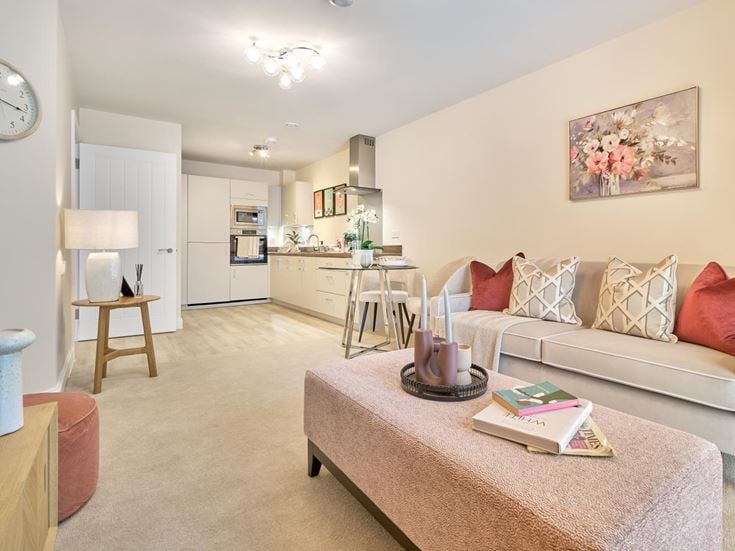 a living room with a couch and a table