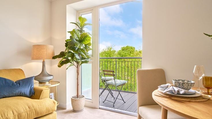 a room with a table and chairs