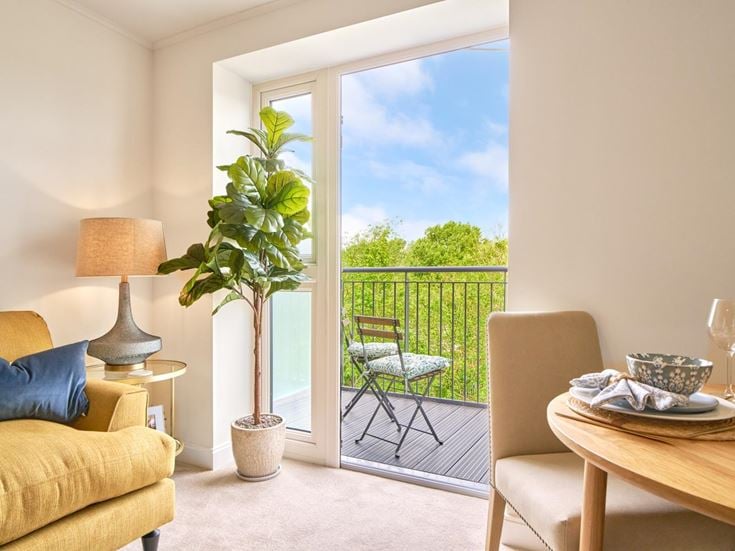 a room with a table and chairs