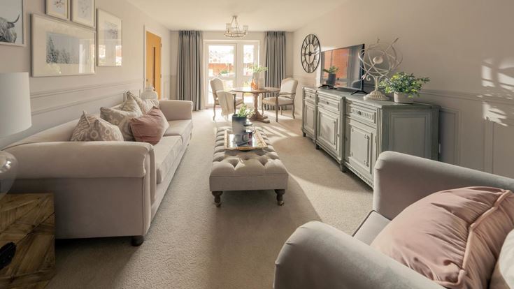 a living room with a couch and a tv