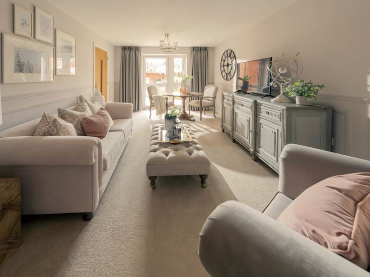 a living room with a couch and a tv
