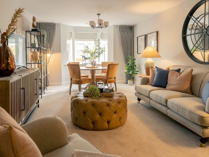 a living room with a round table
